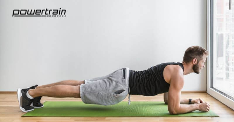 Man doing push ups at home Man doing push ups at home