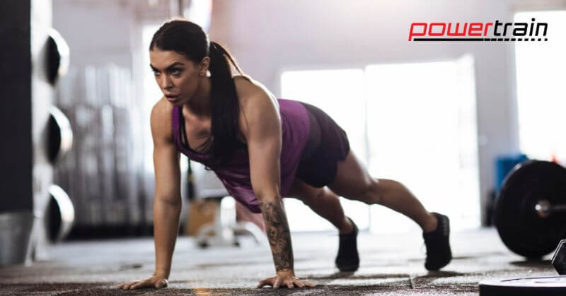 Woman in the middle of a bear crawl