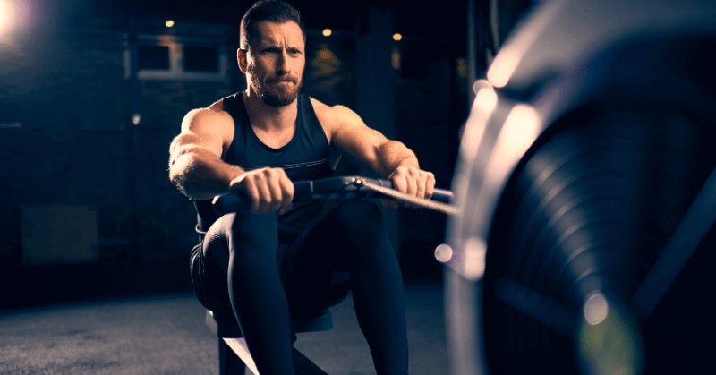 man-on-rowing-machine man-on-rowing-machine
