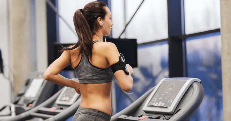 A woman running on a treadmill