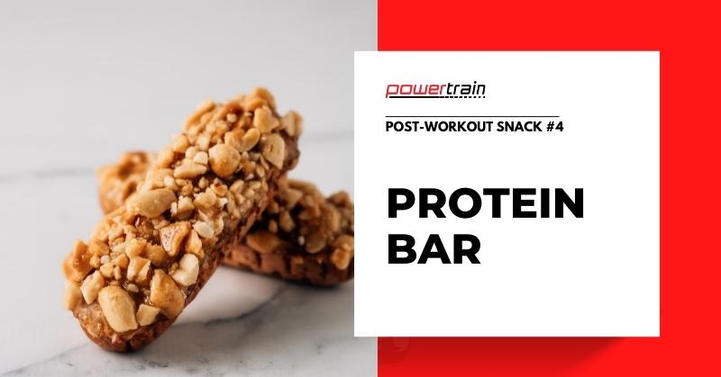 Two protein bars on a plain background