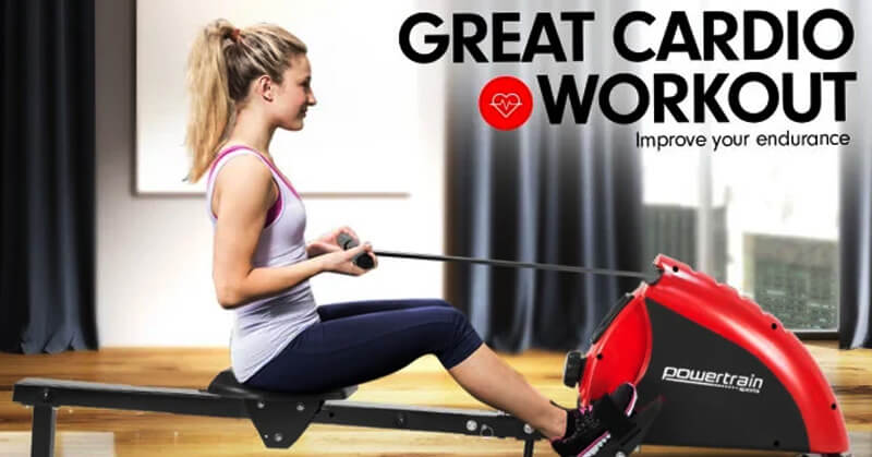 A rowing machine in action A woman using a rowing machine